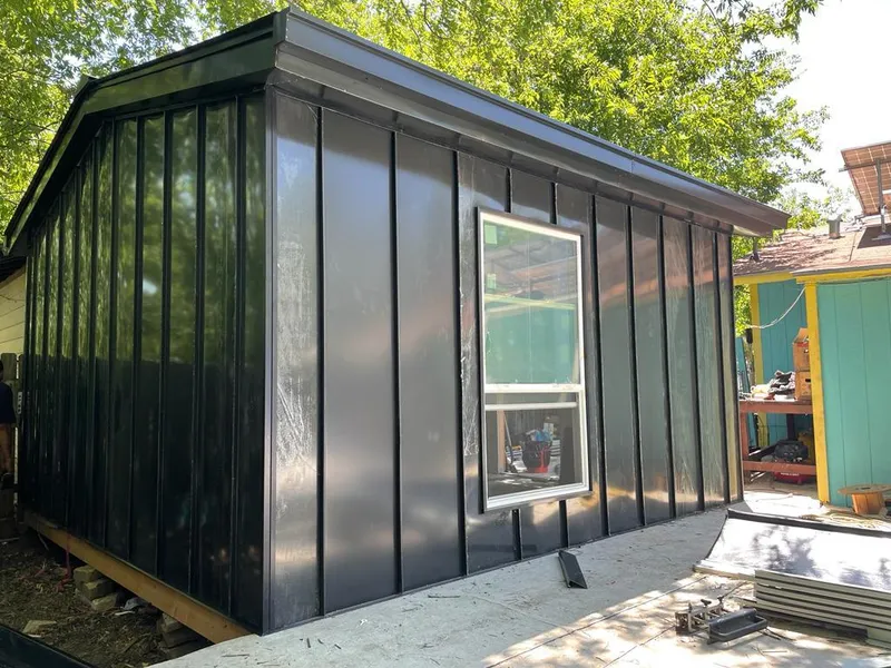 Black standing seam metal wall panels for Metal Roof Installation in South Apopka