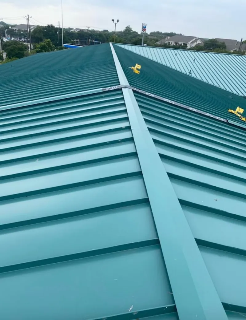 Green commercial metal roof ridge and valley for Metal Roof Repair in South Apopka